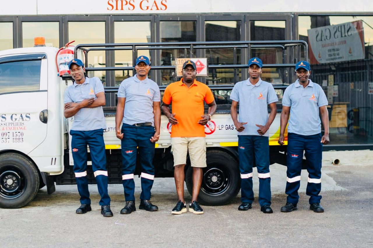 Sips Gas delivery team and vehicle